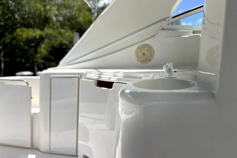 Slide: The Image of 1999 Cruisers Yachts 3870 Esprit interior with sink and storage compartments. - 22