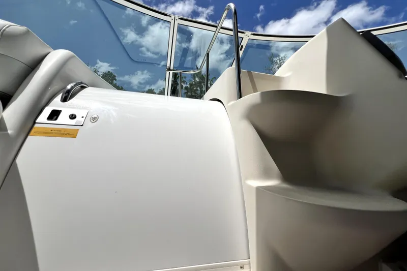 Slide: The Image of 1999 Cruisers Yachts 3870 Esprit cockpit with stairs and clear sky view. - 35