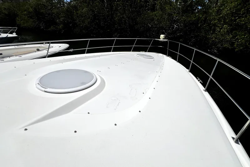 Slide: The Image of 1999 Cruisers Yachts 3870 Esprit boat deck with railing and hatches. - 39