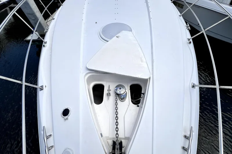 Slide: The Image of 1999 Cruisers Yachts 3870 Esprit bow with anchor chain and deck details. - 46