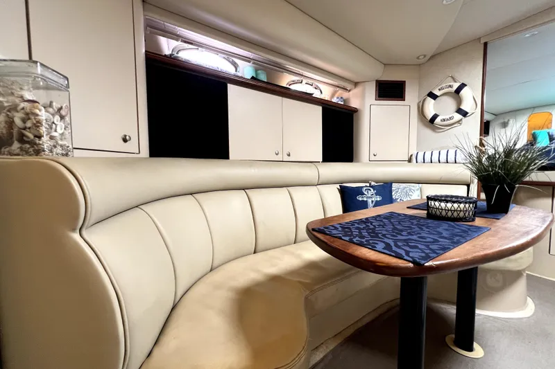 Slide: The Image of Luxurious interior of 1999 Cruisers Yachts 3870 Esprit with elegant seating and decor. - 60
