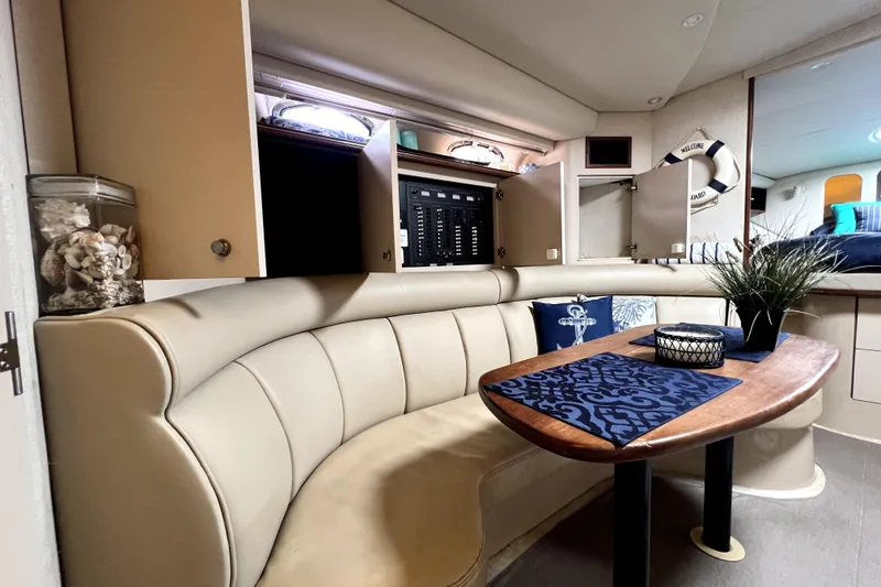 Slide: The Image of Luxurious interior of 1999 Cruisers Yachts 3870 Esprit with elegant seating and decor. - 61