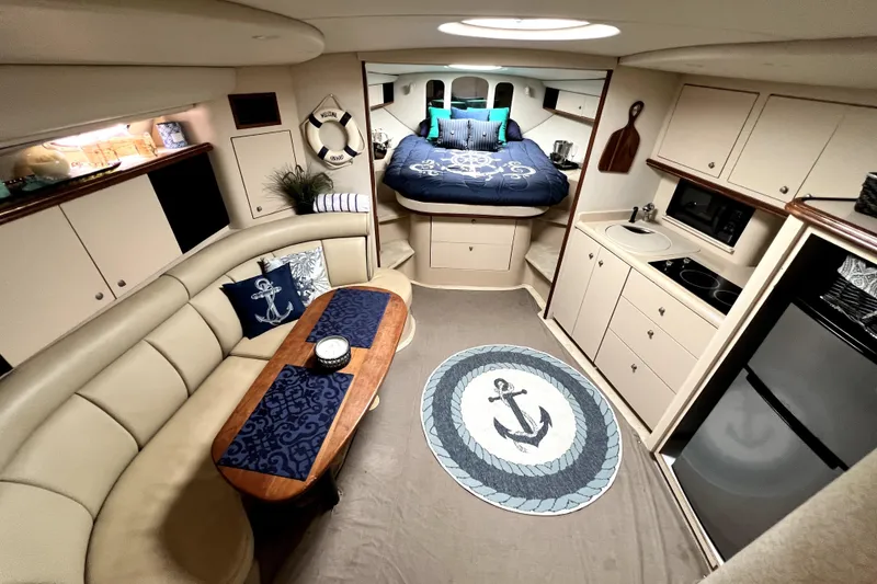 Slide: The Image of Luxurious interior of 1999 Cruisers Yachts 3870 Esprit with nautical decor and modern amenities. - 65