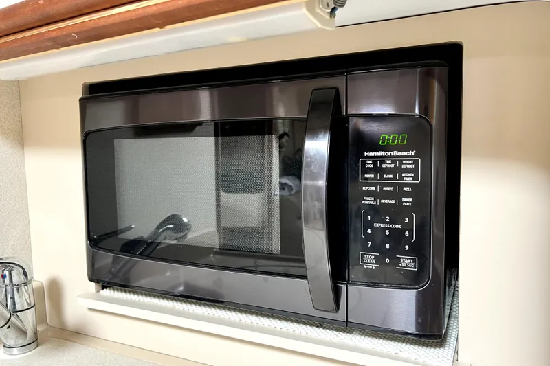 Slide: The Image of Hamilton Beach microwave in 1999 Cruisers Yachts 3870 Esprit kitchen area. - 68