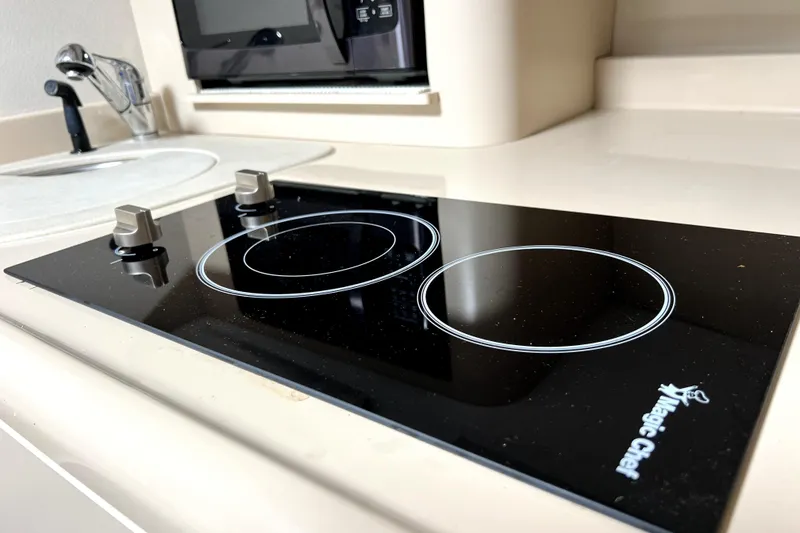 Slide: The Image of Ceramic cooktop in 1999 Cruisers Yachts 3870 Esprit kitchen area. - 70