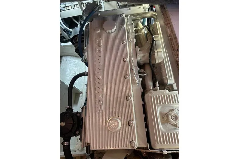 Slide: The Image of Cummins engine in a 1995 Bertram 43 Convertible boat. - 24
