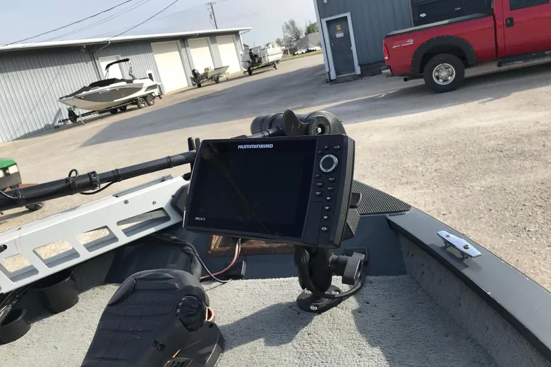 Slide: The Image of Boat dashboard with Humminbird Helix 9 fish finder on a 2001 Ranger 217B Cherokee. - 20