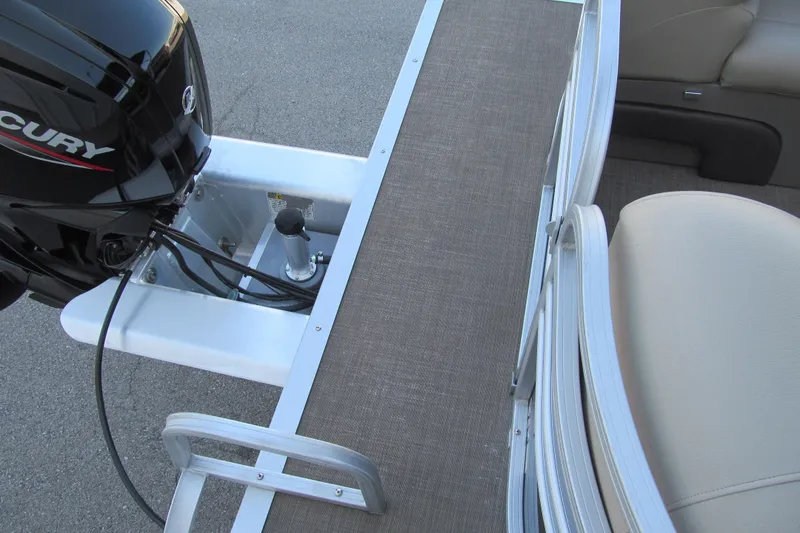 Slide: The Image of 2022 Sun Tracker Party Barge 22 DLX with Mercury outboard motor, rear deck view. - 16