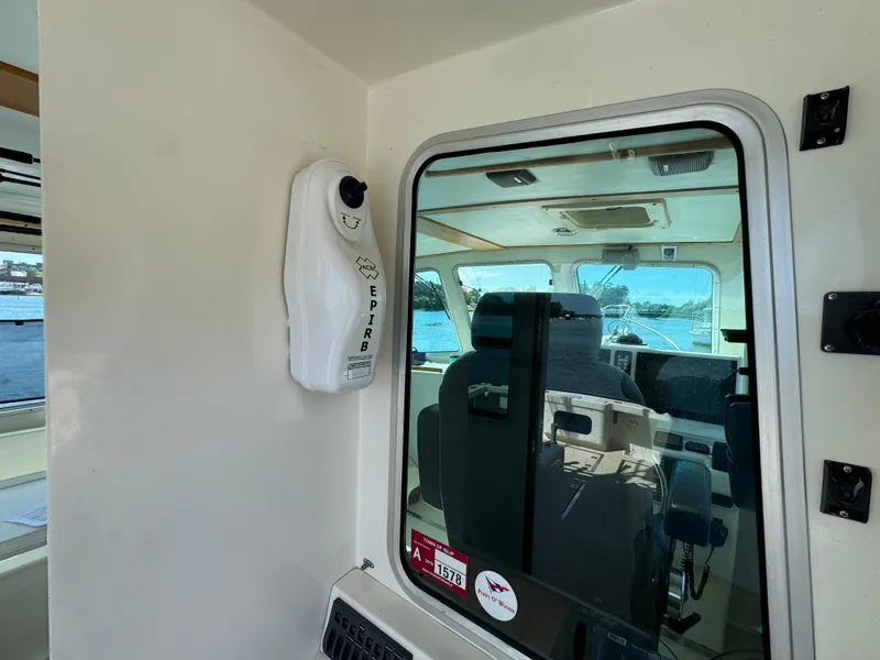 Slide: The Image of Interior view of a 2009 Northern Bay 36 boat with EPIRB device. - 37