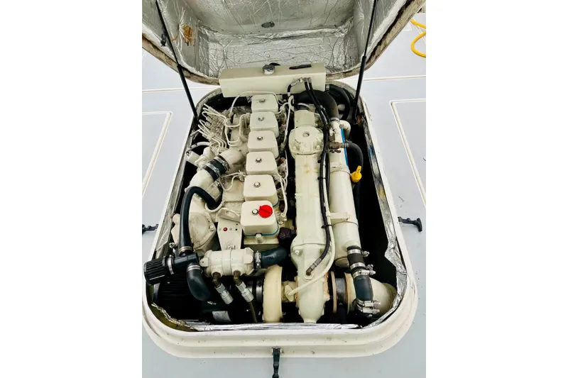 Slide: The Image of Engine compartment of a 2002 Albin 28 Tournament Express boat. - 10