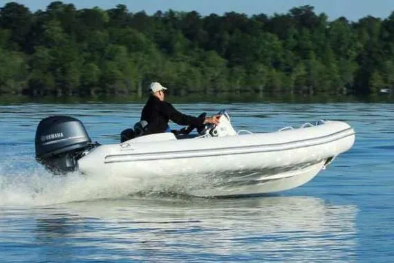 The Image of Manufacturer Provided Image: Zodiac Yachtline 440 from 2026 on a calm lake. - 0