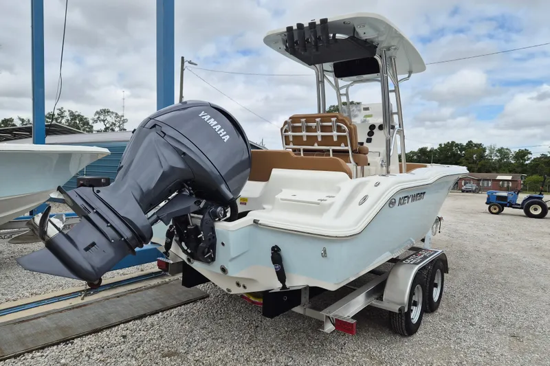 Slide: The Image of 2026 Key West 219 FS boat with Yamaha outboard motor on trailer. - 3