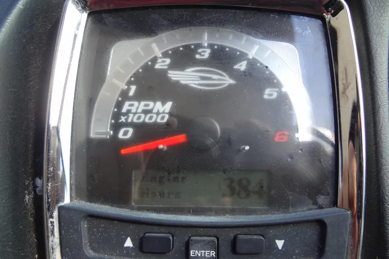 Slide: The Image of Close-up of 2008 Chaparral 276 SSX tachometer displaying RPM and engine hours. - 28