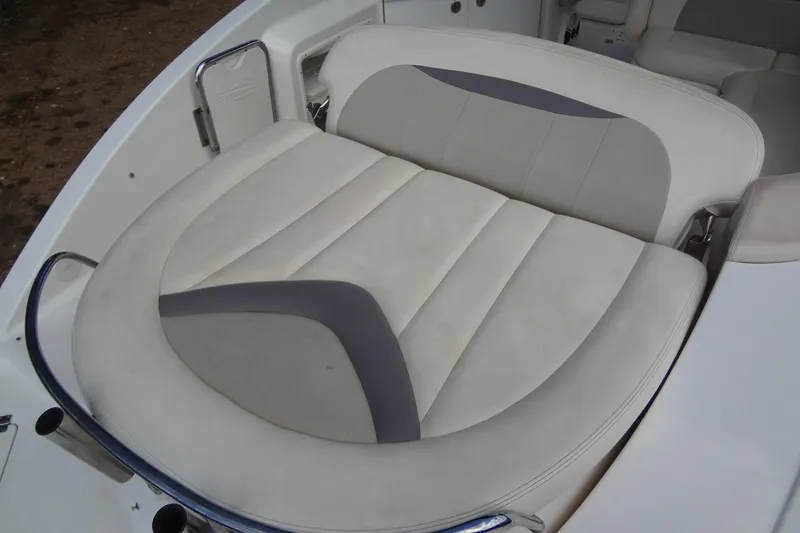 Slide: The Image of 2008 Chaparral 276 SSX boat seating with white and gray upholstery. - 37