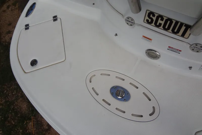Slide: The Image of 2008 Chaparral 276 SSX boat deck with storage hatch and "SCOUT" label. - 39
