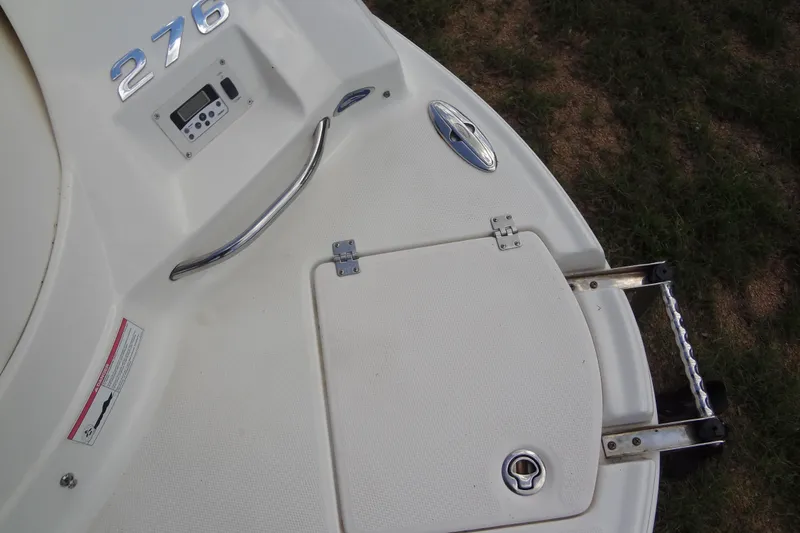 Slide: The Image of 2008 Chaparral 276 SSX boat deck with ladder and control panel. - 40