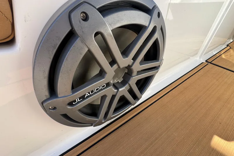 Slide: The Image of JL Audio speaker on 2021 MasterCraft NXT24 boat deck. - 17