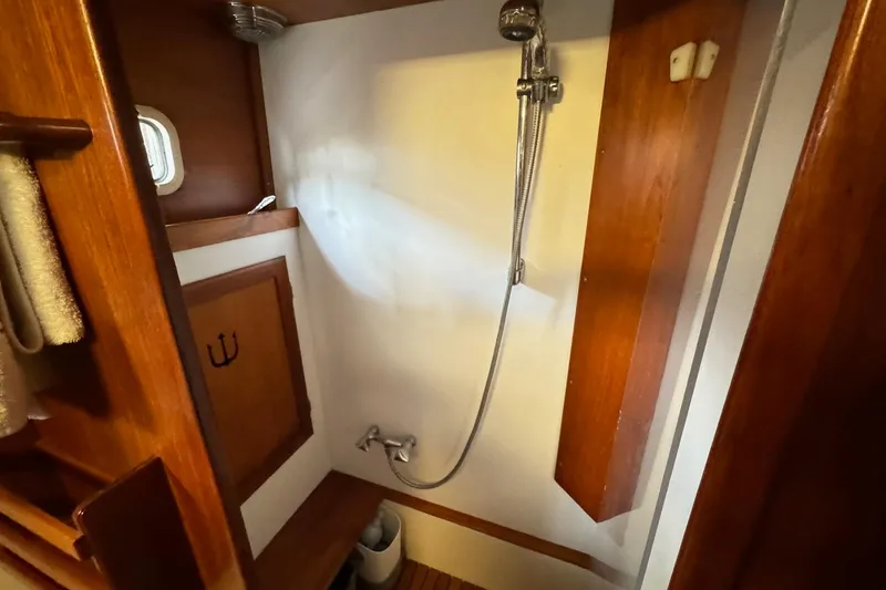 Slide: The Image of Shower area in 1987 Lyman-Morse Hunt 42 yacht with wooden accents. - 20