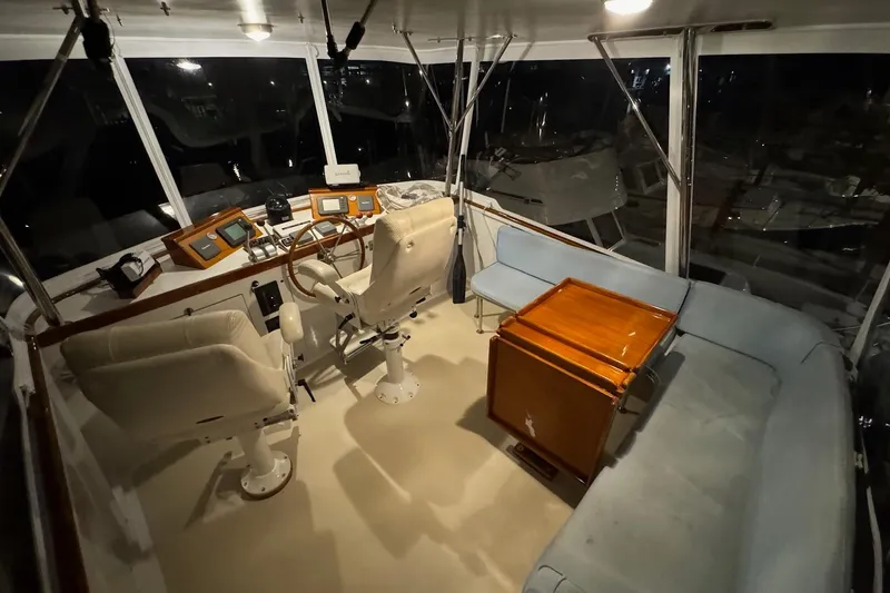 Slide: The Image of Interior of 1987 Lyman-Morse Hunt 42 yacht with helm, seating, and navigation equipment. - 21