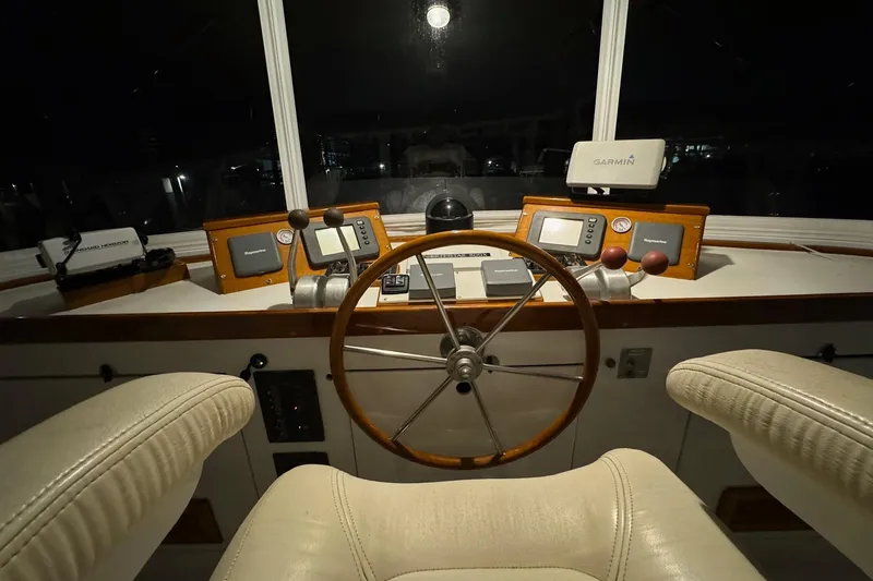 Slide: The Image of Helm of 1987 Lyman-Morse Hunt 42 boat with navigation equipment and steering wheel. - 26