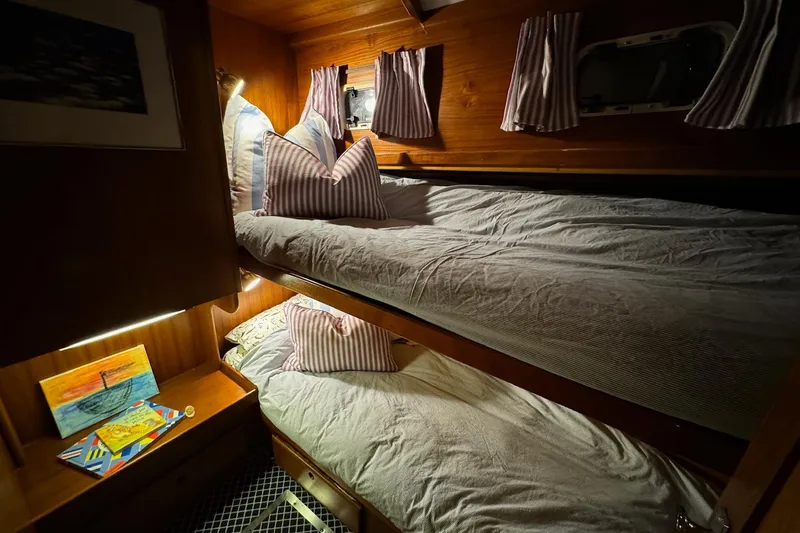 Slide: The Image of Cozy cabin interior with bunk beds on 1987 Lyman-Morse Hunt 42 yacht. - 49