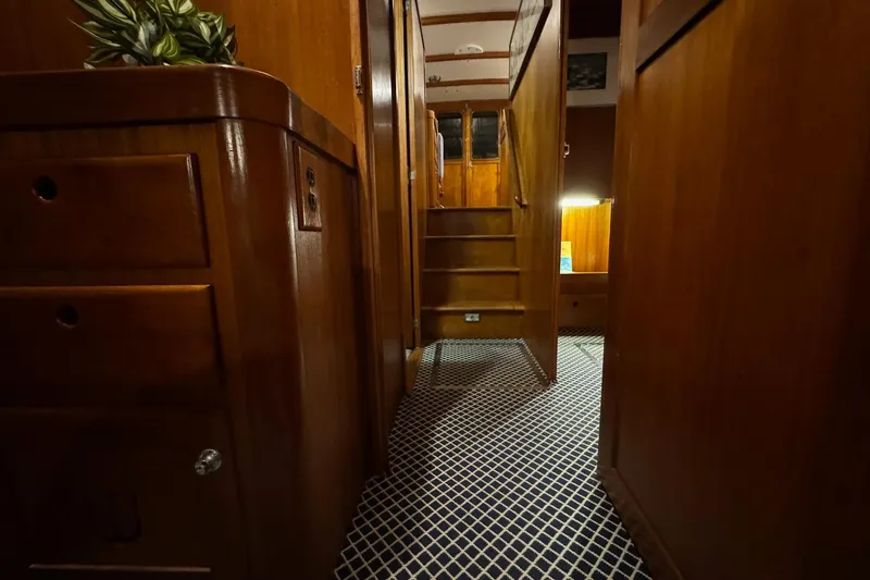 Slide: The Image of Interior of 1987 Lyman-Morse Hunt 42 yacht with wooden cabinetry and carpeted flooring. - 50