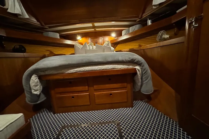 Slide: The Image of Cozy cabin interior of 1987 Lyman-Morse Hunt 42 yacht with wooden furnishings. - 54