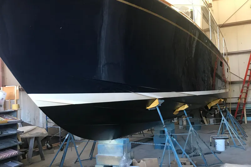 Slide: The Image of 1987 Lyman-Morse Hunt 42 yacht in a shipyard. - 7