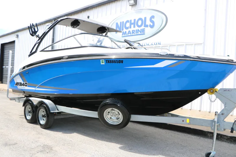 The Image of 2017 Yamaha Boats AR240 HO in blue on trailer at Nichols Marine. - 1