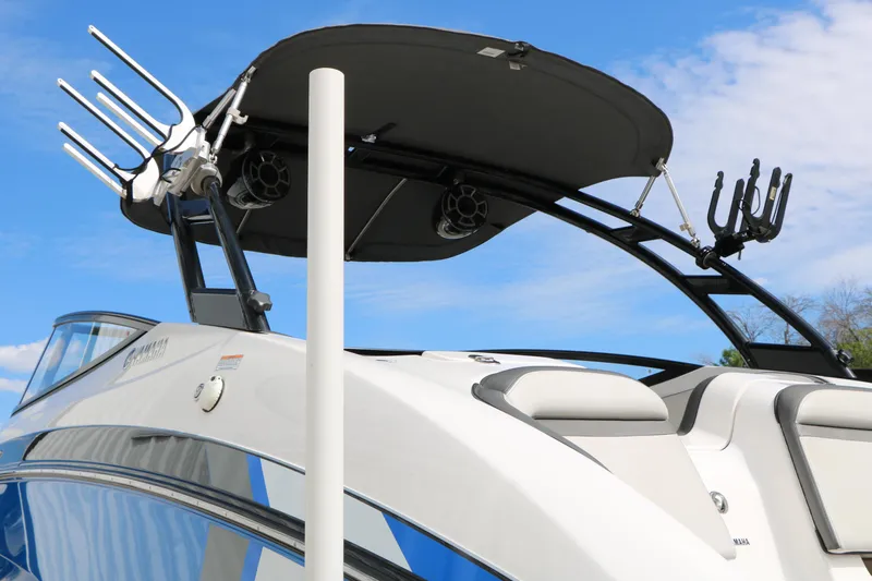 Slide: The Image of 2017 Yamaha Boats AR240 HO with wakeboard tower against blue sky. - 10