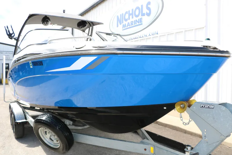 Slide: The Image of 2017 Yamaha Boats AR240 HO in blue on trailer at Nichols Marine. - 13