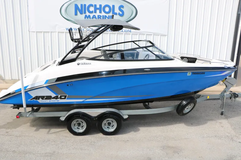 Slide: The Image of 2017 Yamaha Boats AR240 HO in blue on trailer at Nichols Marine. - 15