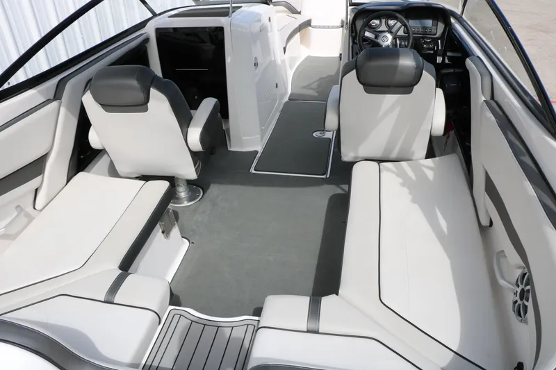 Slide: The Image of 2017 Yamaha Boats AR240 HO interior with sleek seating and modern dashboard design. - 23