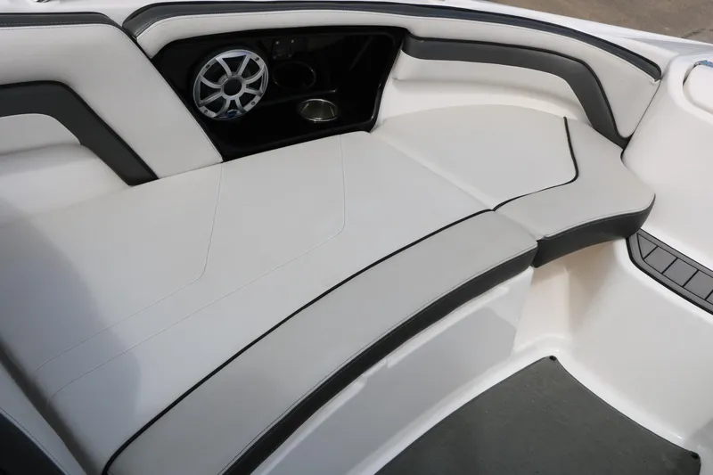 Slide: The Image of 2017 Yamaha Boats AR240 HO interior seating with speaker and cup holder. - 25