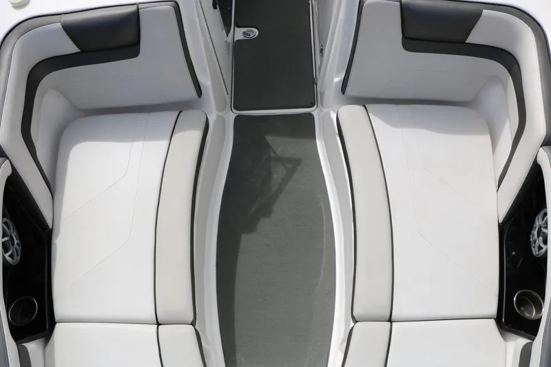 Slide: The Image of 2017 Yamaha Boats AR240 HO interior seating with sleek white and black upholstery. - 28