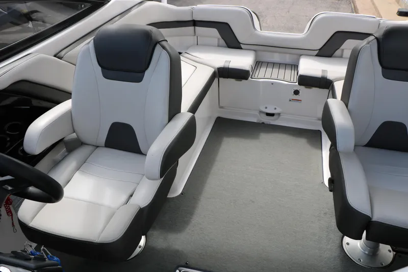 Slide: The Image of 2017 Yamaha Boats AR240 HO interior with gray and black seating. - 29
