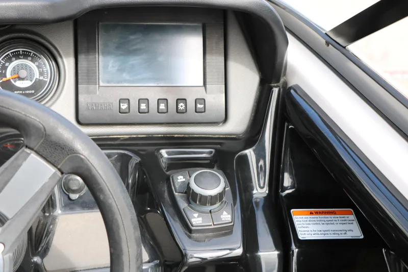 Slide: The Image of 2017 Yamaha Boats AR240 HO dashboard with controls and display screen. - 33