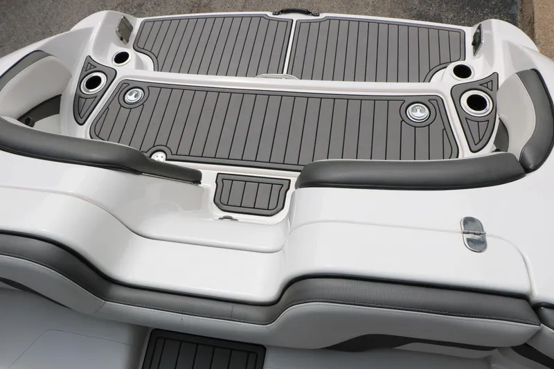 Slide: The Image of 2017 Yamaha Boats AR240 HO swim platform with cushioned seating and cup holders. - 36