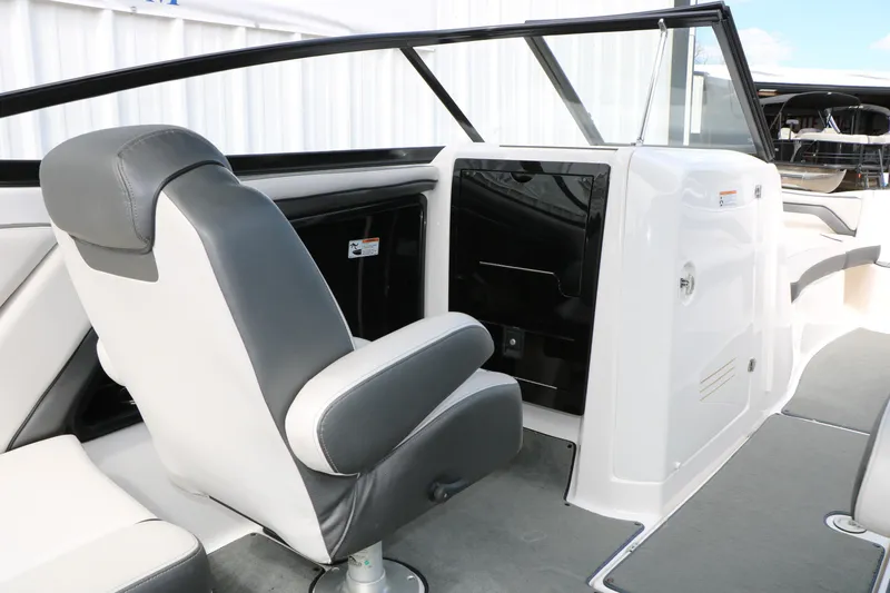 Slide: The Image of 2017 Yamaha Boats AR240 HO interior with sleek seating and modern dashboard design. - 37