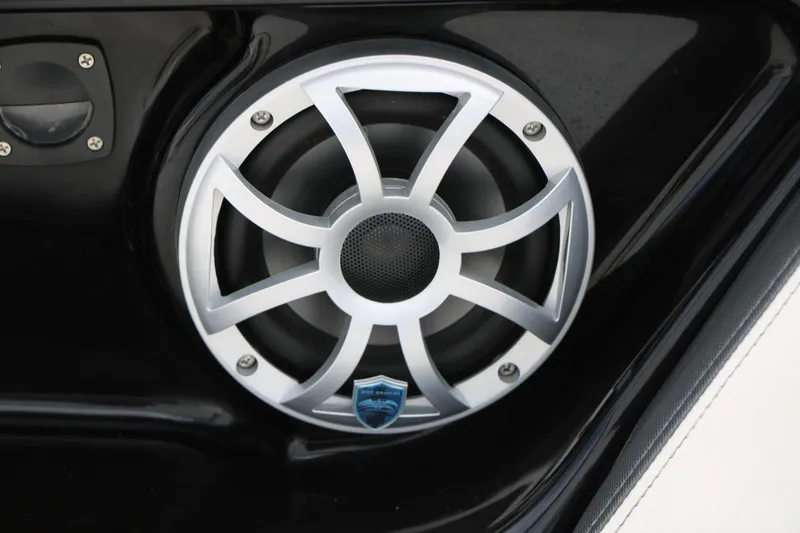 Slide: The Image of Speaker detail on 2017 Yamaha Boats AR240 HO, featuring sleek silver grille design. - 47