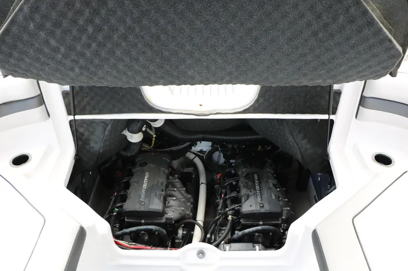 Slide: The Image of Engine compartment of a 2017 Yamaha Boats AR240 HO, showcasing dual engines. - 48