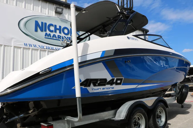 Slide: The Image of 2017 Yamaha Boats AR240 HO in blue and white at Nichols Marine dealership. - 5