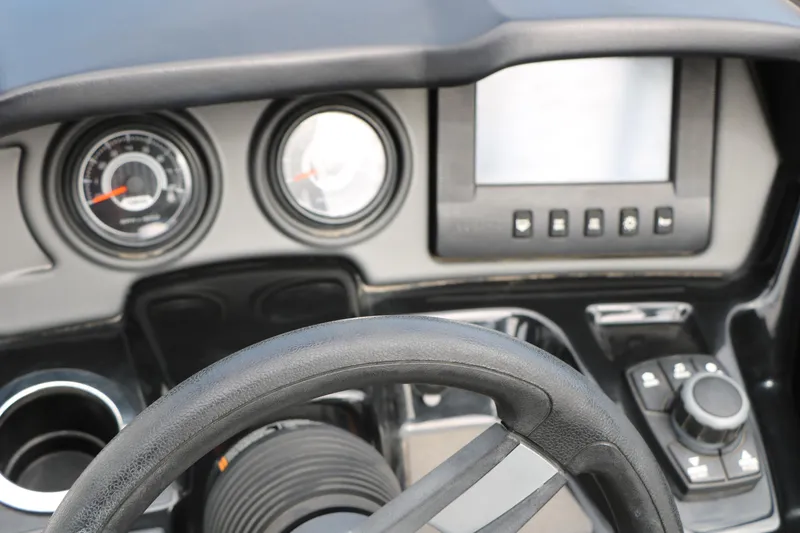 Slide: The Image of 2017 Yamaha Boats AR240 HO dashboard with steering wheel and control panel. - 50