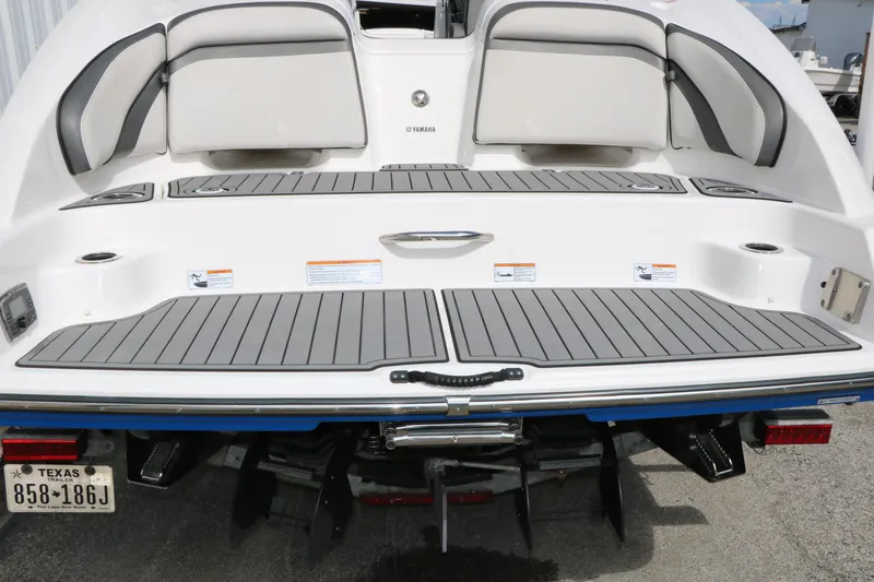 Slide: The Image of 2017 Yamaha Boats AR240 HO swim platform with seating and non-slip surface. - 8
