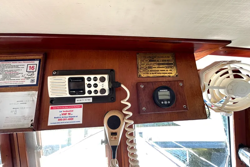 Slide: The Image of 1987 Transpacific Marine Eagle 32 Trawler dashboard with radio and control panel. - 40