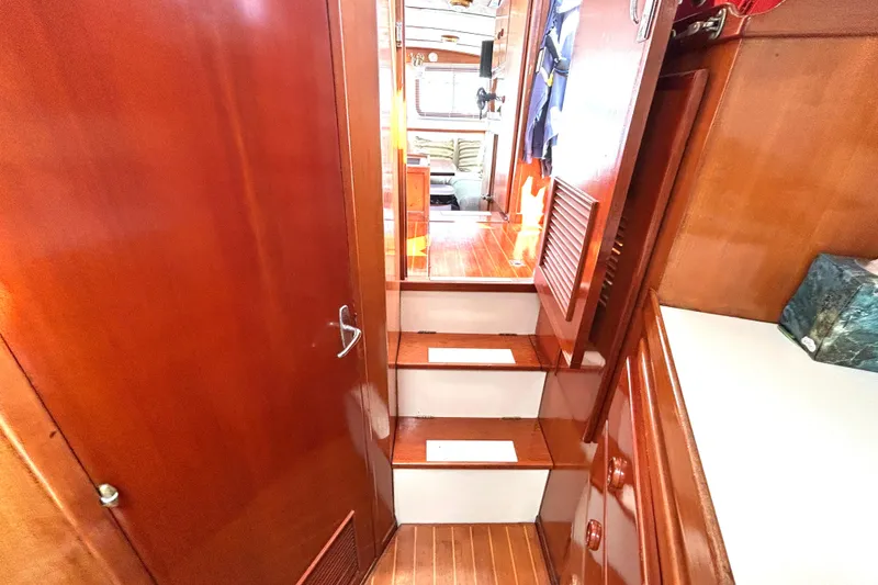 Slide: The Image of Interior of 1987 Transpacific Marine Eagle 32 Trawler with wooden stairs and cabinetry. - 47