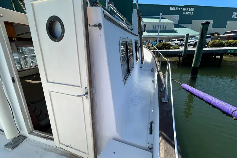 Slide: The Image of 1987 Transpacific Marine Eagle 32 Trawler docked at Holiday Harbor Marina. - 9