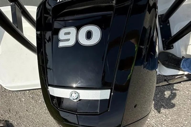 Slide: The Image of 2026 Bayliner M17 boat with a 90 horsepower engine, black exterior. - 5