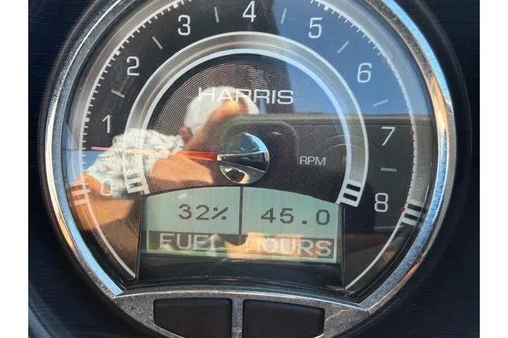 Slide: The Image of Gauge display of 2022 Harris Grand Mariner 250 showing 32% fuel and 45 hours. - 15