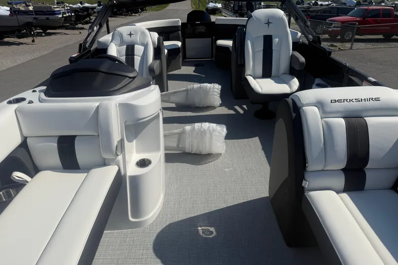 Slide: The Image of Luxurious interior of 2026 Berkshire CTS Series 24RFX pontoon boat with plush seating. - 13